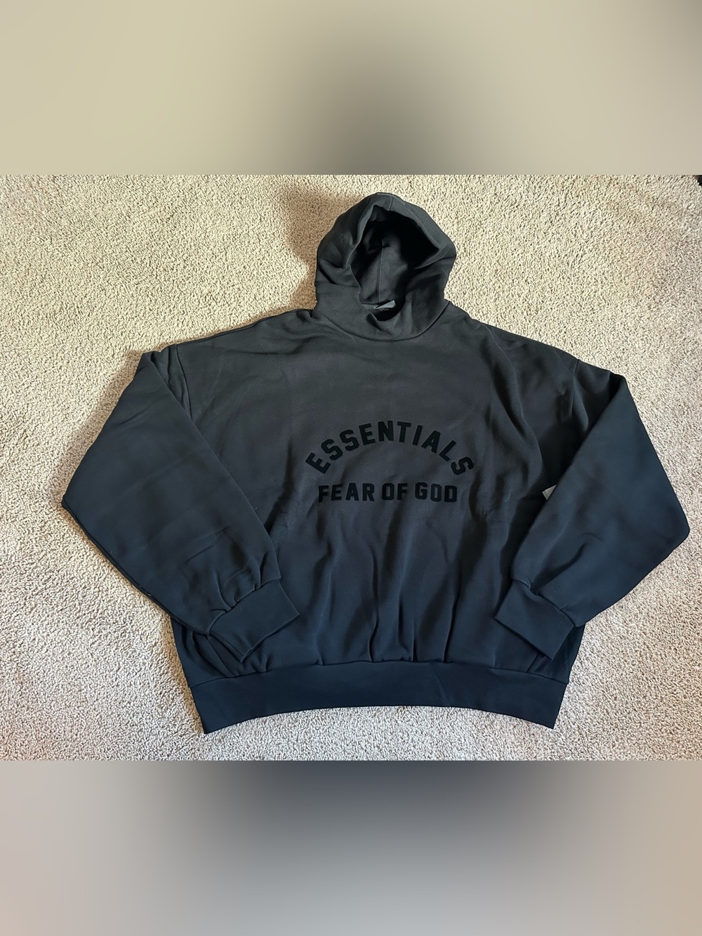 Essentials Fear of God Black Pullover Hoodie.